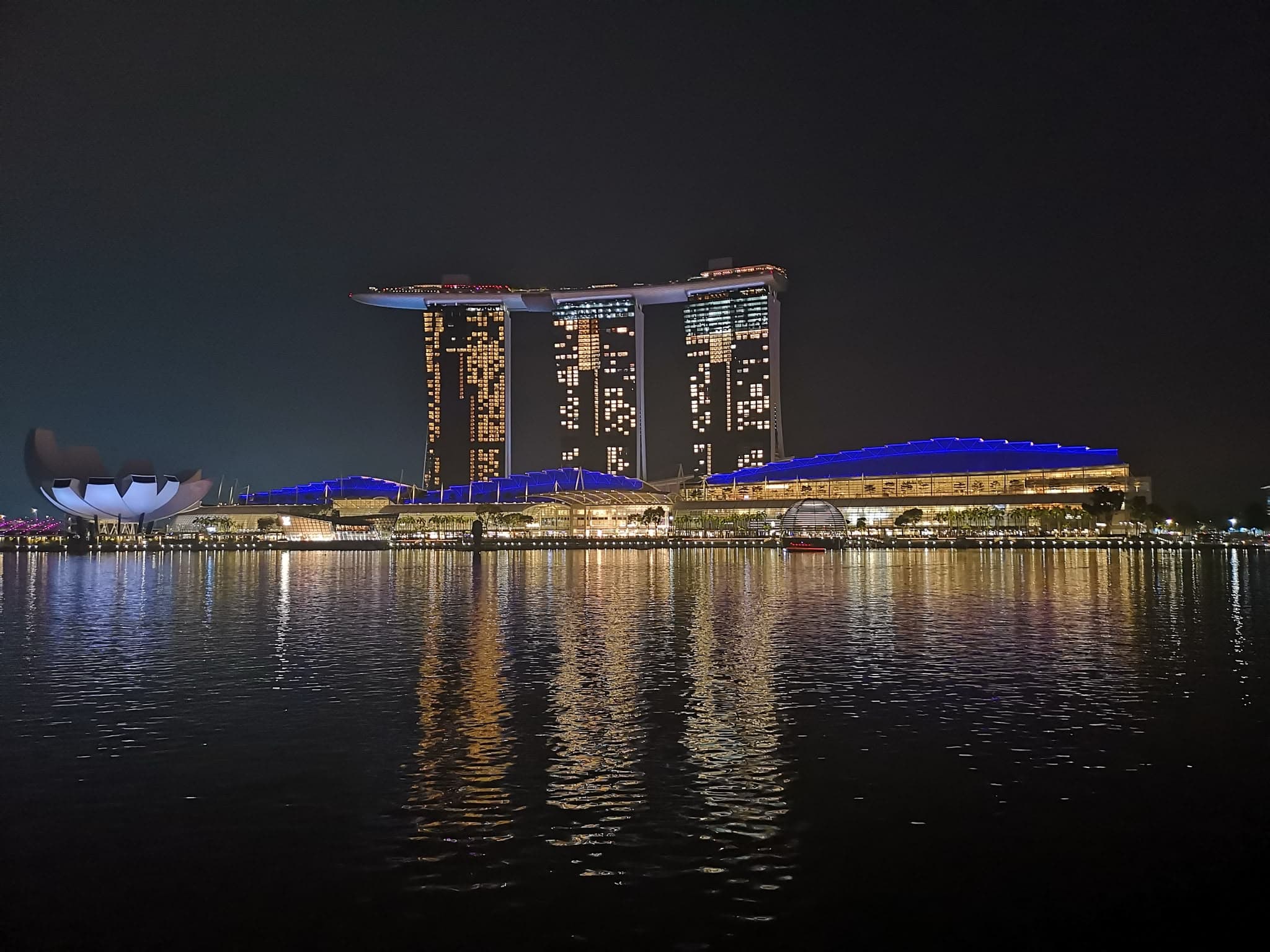 Marina Bay Sands and the ArtScience Museum reflected in Marina Bay at night, Singapore
